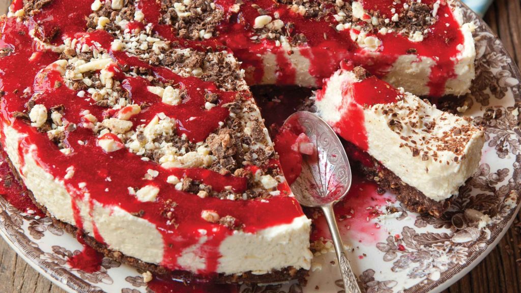 WHITE CHOCOLATE CHEESECAKE WITH RASPBERRY PURÉE